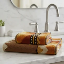 CARRARA Set 1+1 asciugamano + ospite Oseye zig-zag marrone bruciato
