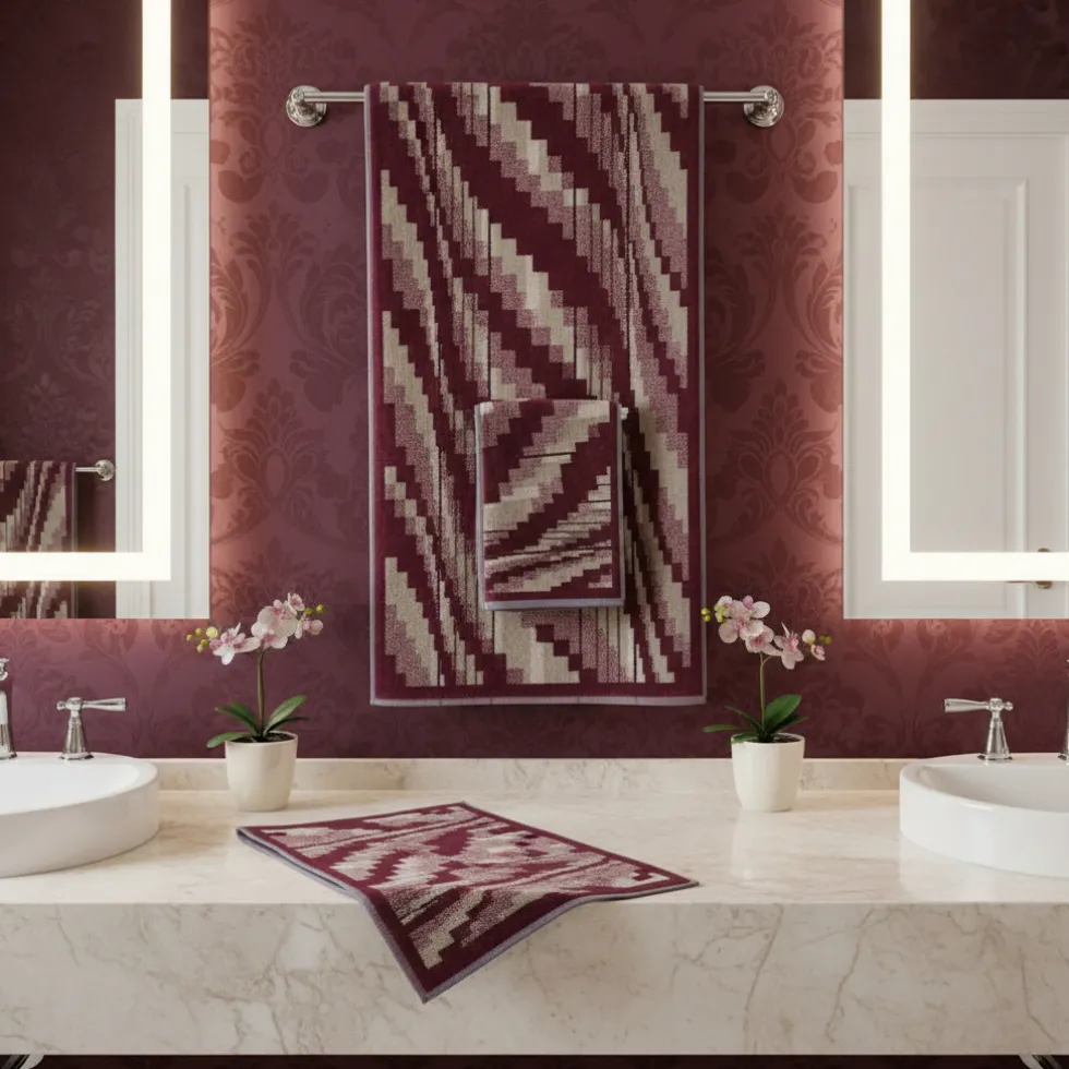 Coppia Asciugamani set 1+1 Carrara Bowery bordeaux in spugna