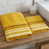 Coppia di asciugamani bagno viso+ospite senape con bordo a righe