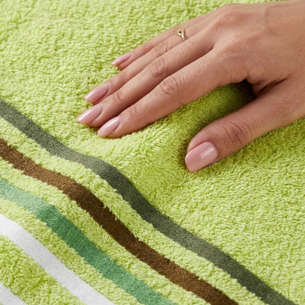 Coppia di asciugamani 100% cotone lime con righe nel bordo