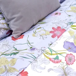 Lenzuola matrimoniali con balza a giorno in cotone Fiori di Campo lilla