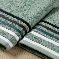 Set 1+1 asciugamano viso con ospite verde salvia con bordo a righe in tono